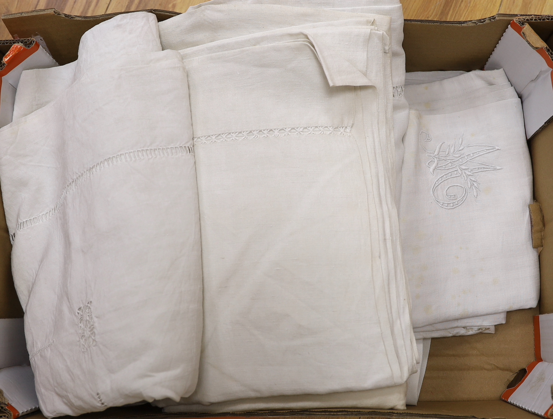 Six coarse French provincial linen sheets, button holed and embroidered monogrammed turn backs